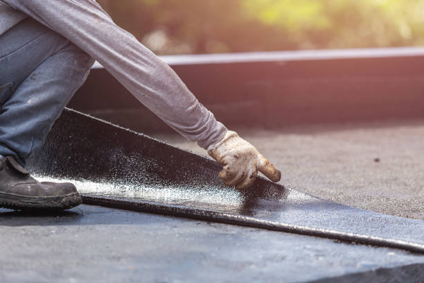 Professional Waterproofing technician working in Lowell, WI